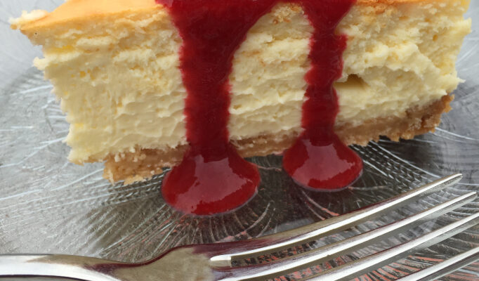 Lemon Cheesecake with Shortbread Crust and Raspberry Coulis