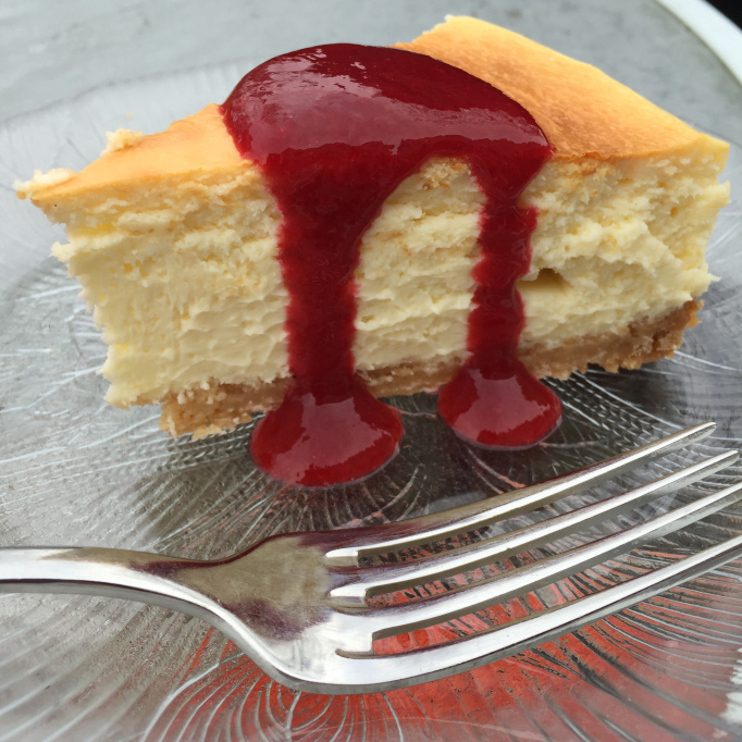 Lemon Cheesecake with Shortbread Crust and Raspberry Coulis