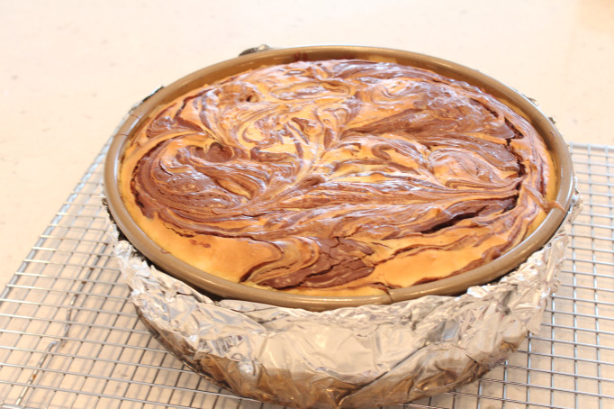 choco-colada cheesecake cooling