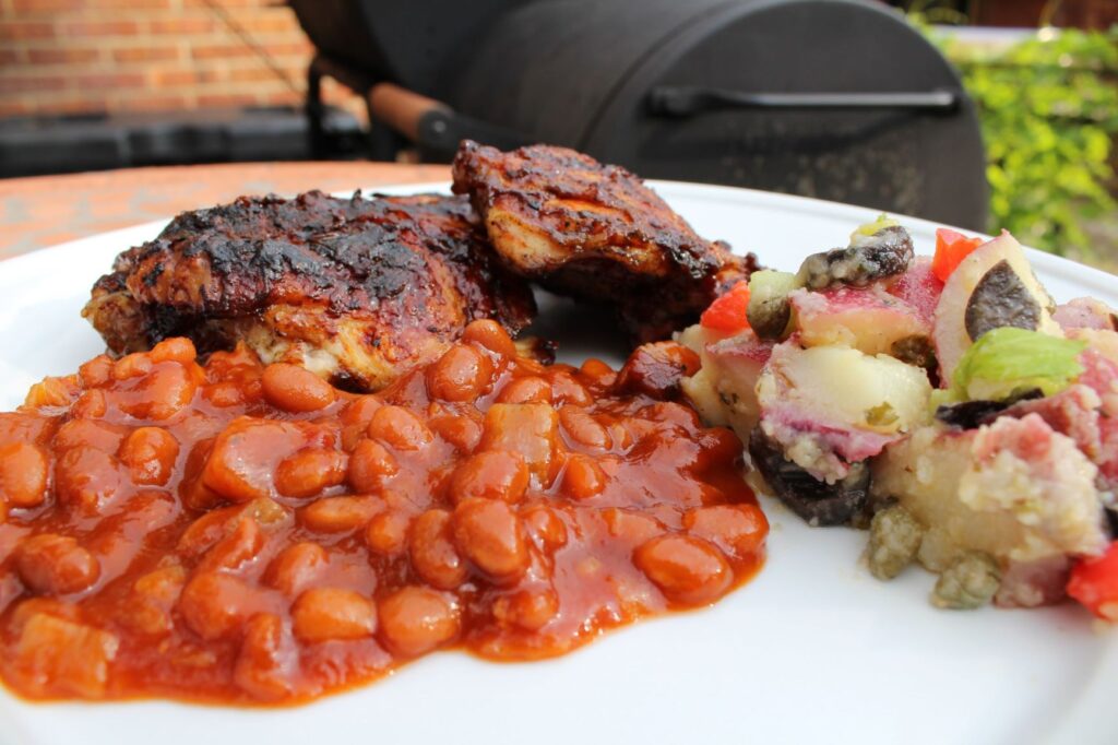 Baked beans, barbecue chicken and potato salad
